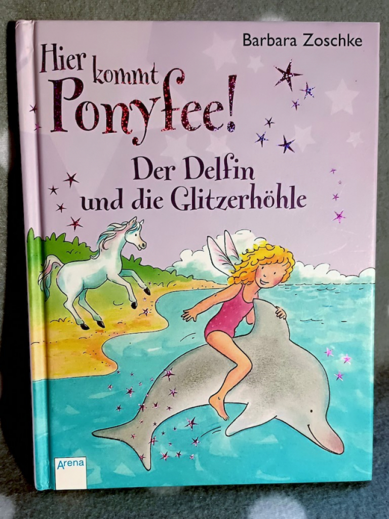 Buch: Hier kommt Ponyfee Der Delfin und die Glitzerhöhle Buch: Hier kommt Ponyfee Der Delfin und die Glitzerhöhle