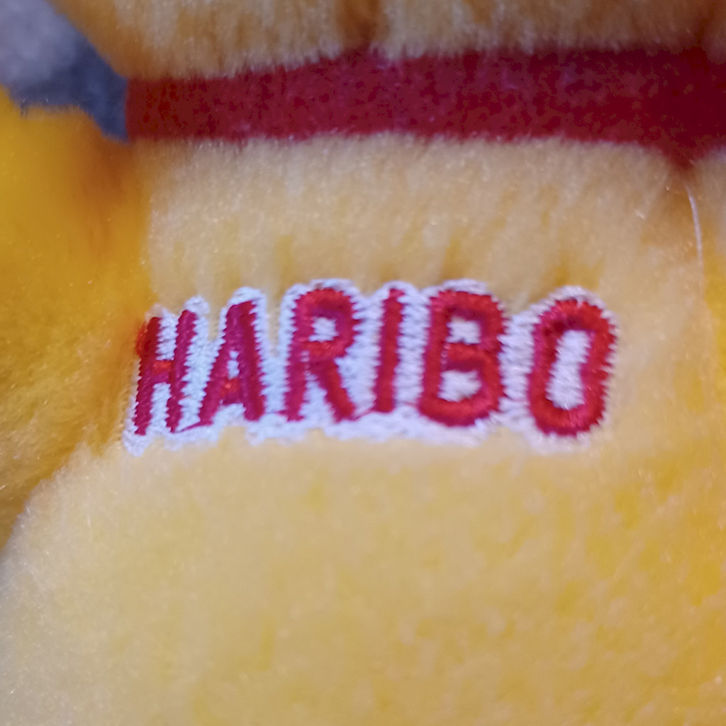 HARIBO Goldbär Plüschtier ca. 20cm Kuscheltier Stofftier Bär Gelb rote Schleife